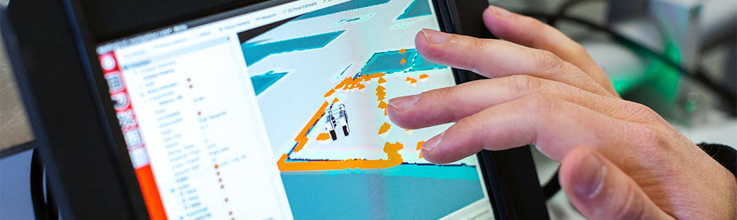 A hand using a digital map on a device